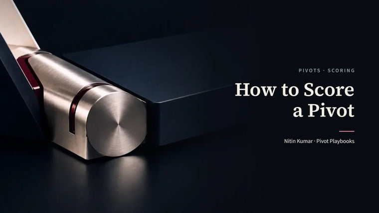A machined platinum hinge joining two navy planes at a measured angle, the cover for How to Score a Pivot by Nitin Kumar