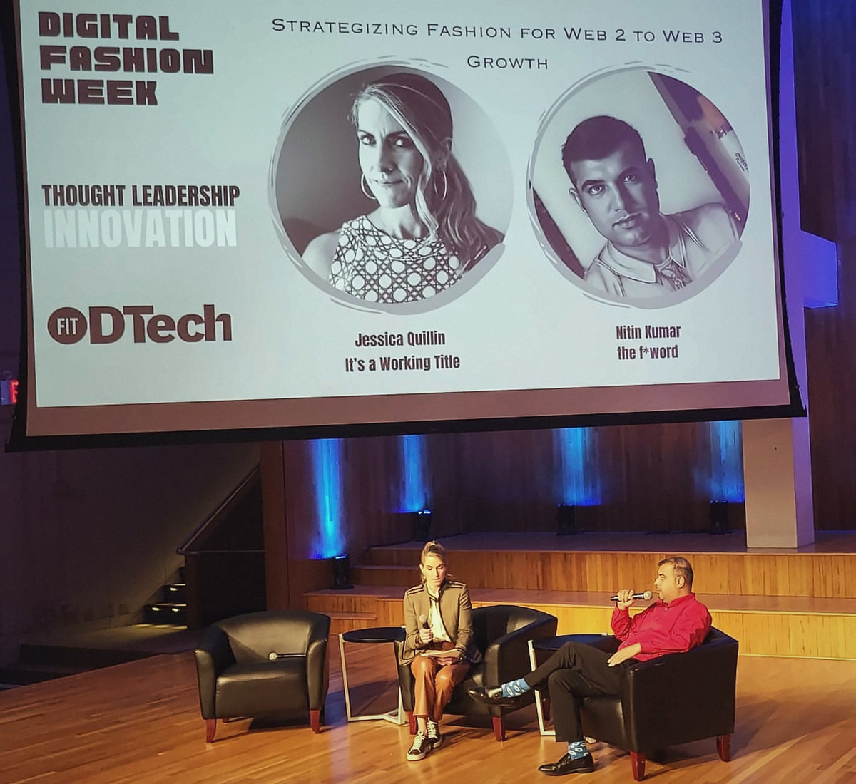Nitin Kumar, right, in a red shirt, on stage with Jessica Quillin of It’s a Working Title at Digital Fashion Week 2024 at FIT DTech, speaking on the AI pivot opportunity for the fashion industry